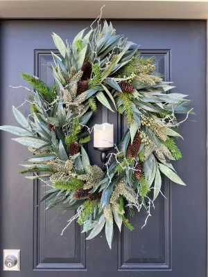 A Christmas Gathering Winter Wreath with Flickering Candle